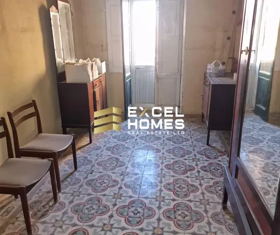 a room with a large mirror and a table