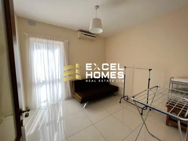 a couch and a lamp in a room