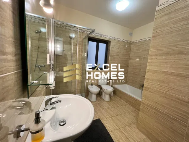 a bathroom with a sink, toilet and bathtub