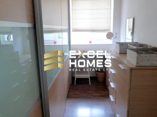 a kitchen with a window and a table 
