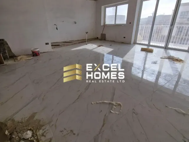 a room with a window and a floor