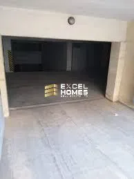 a sign that says "no parking" on the side of a building