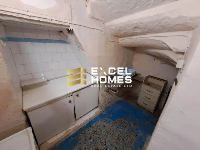 a bathroom with a toilet and a sink