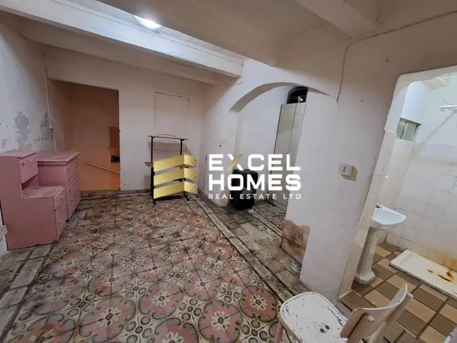 a bathroom with a toilet, sink, and bathtub