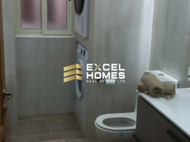 a cat sitting on a toilet in a bathroom