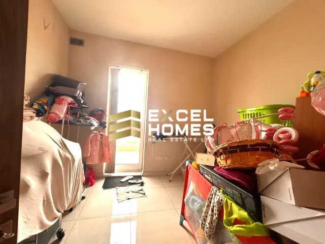 a man in a hat is standing in front of a counter