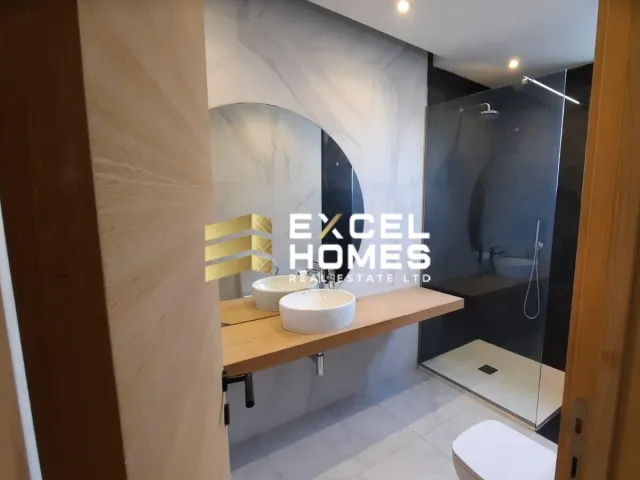 a bathroom with a toilet and a sink