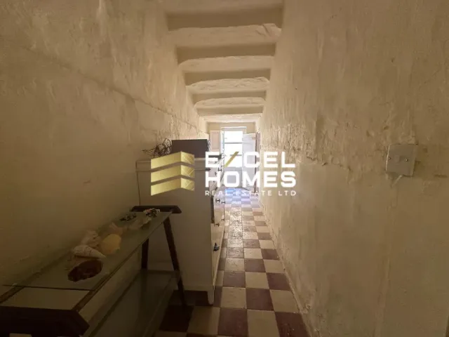 a bathroom with a toilet and a sink