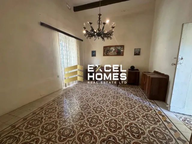 a large room with a large mirror and a rug