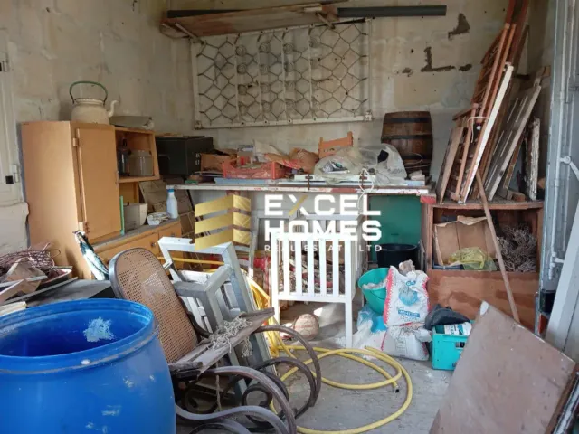 a room with a lot of clutter and a lot of tools