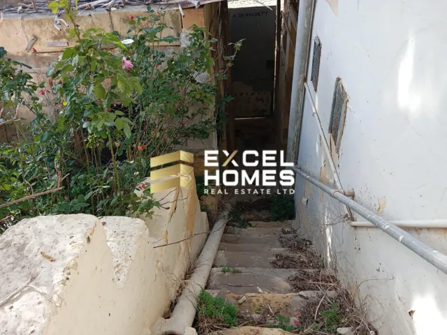 a toilet and a wall in a building