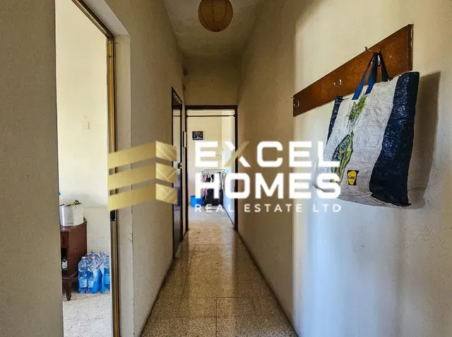 a room with a door open and a door open 