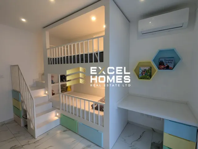 a bathroom with a sink, toilet and a shelf 