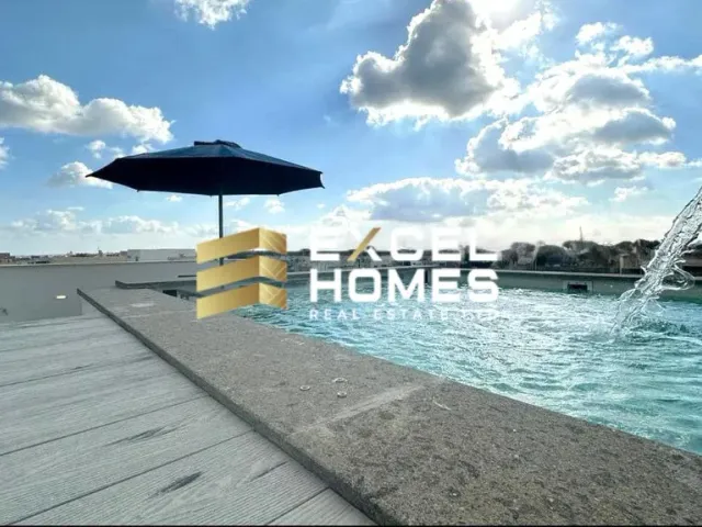 a pool with a blue umbrella and a blue chair