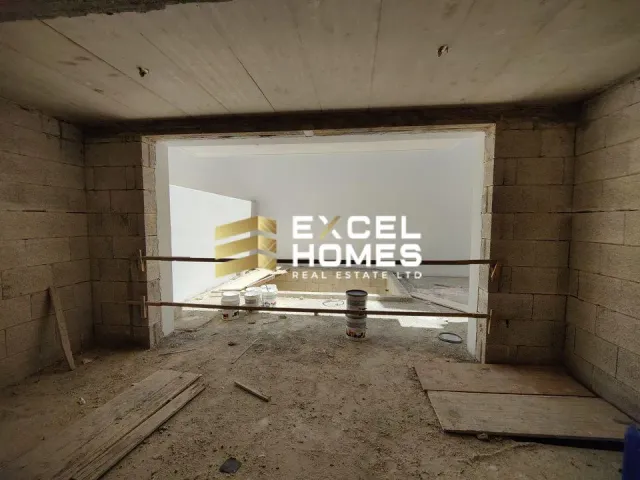 a wall with a painting of a man in a wheelchair