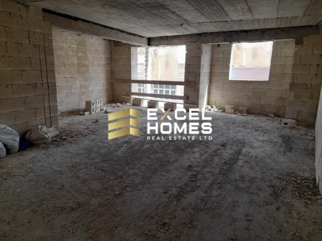 a room with a barn and a building