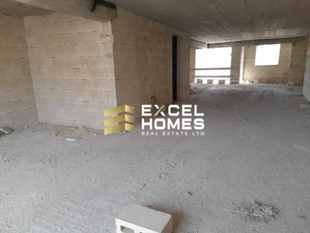 a room with a brick wall and a brick wall