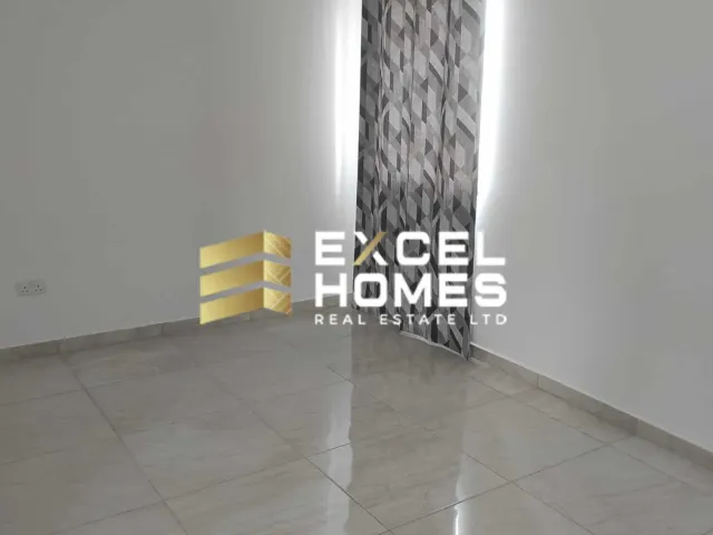 a room with a wall with a curtain