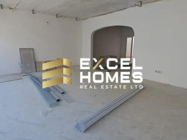 a bench in a building with graffiti on it 