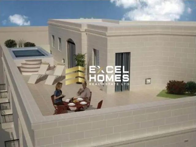 a man sitting on a couch next to a building