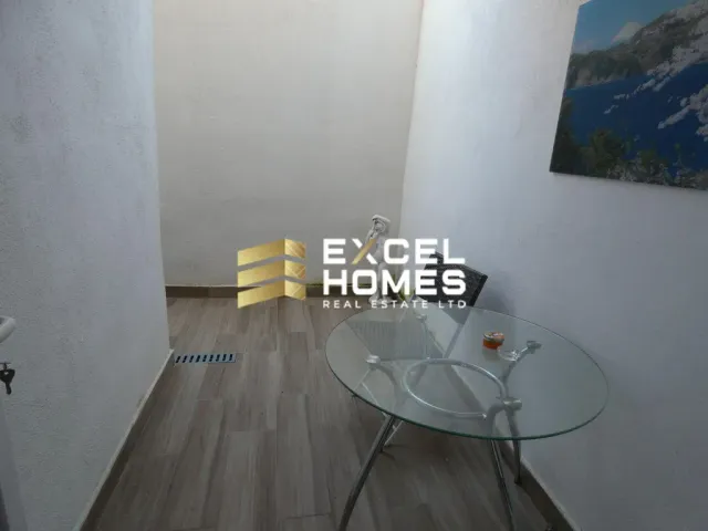 a room with a table and a chair