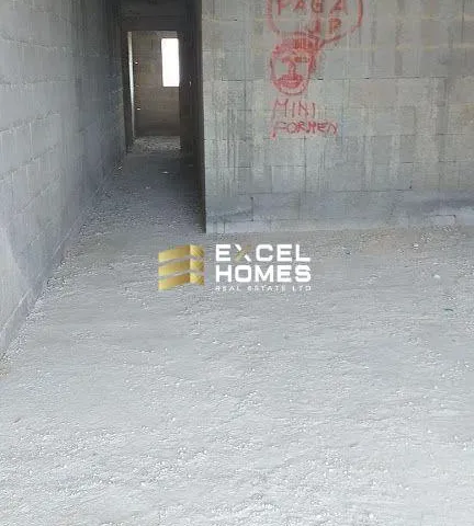 a wall with a broken down door and a broken down wall