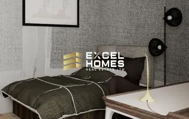 a bed with a white bedspread and a black and white bedspread