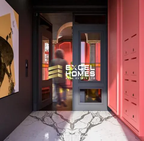 a man walking past a door with a red door
