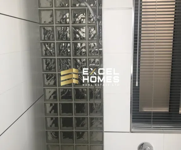 a wall with a bunch of glass doors