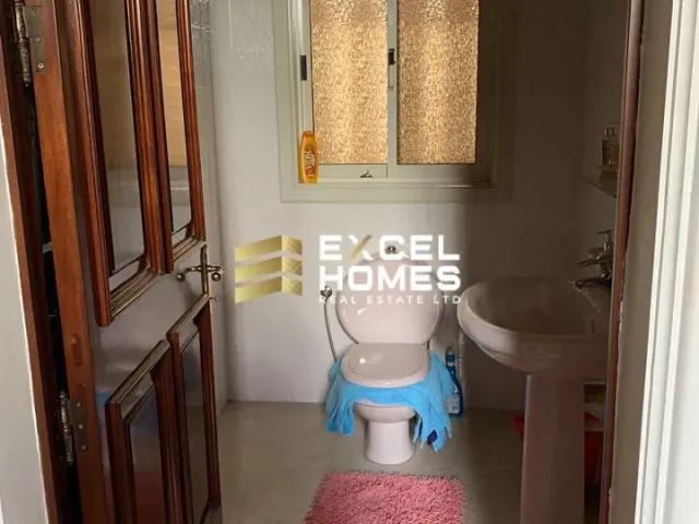 a small bathroom with a toilet and a sink