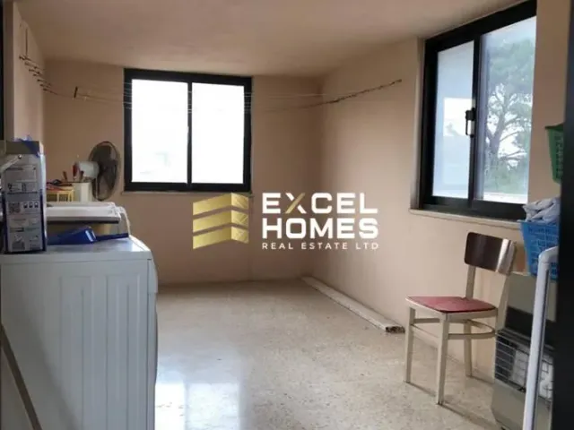 a room with a table and a window