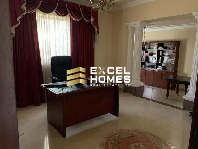 a room with a desk and a chair