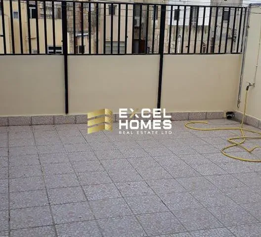 a wall with a door and a door handle