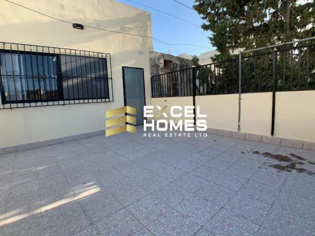 a sign that says "no parking" on a sidewalk