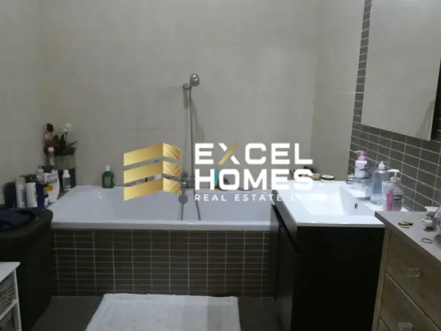 a bathroom with a sink, toilet and bathtub