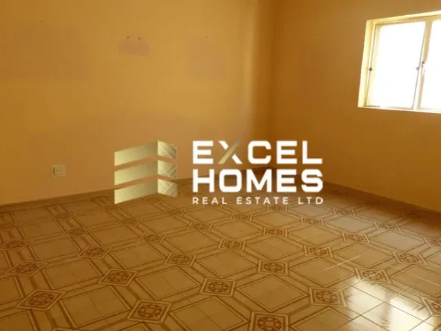 a room with a wall with a wall of drawers