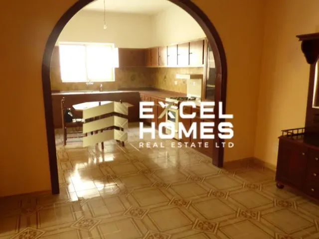 a room with a table and a window