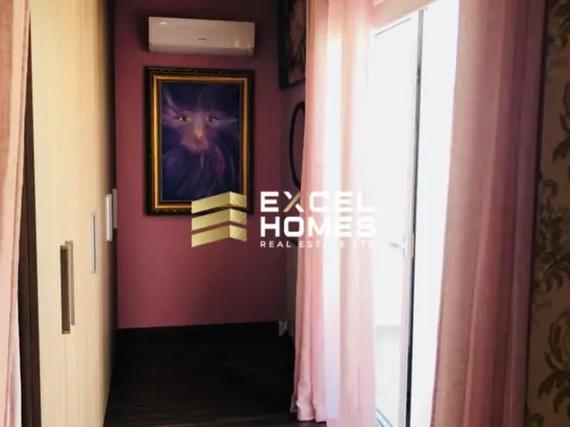 a door that is open to a room with a picture of a cat on it 