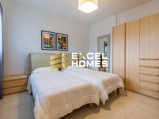 a bed with a white bedspread and a white bedspread 