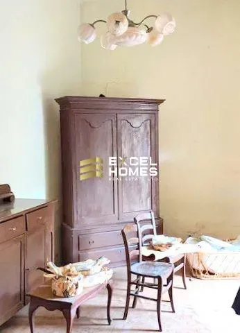 a wooden cabinet with a wooden head board