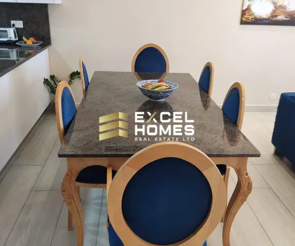 a table with a table cloth and a table cloth with a book