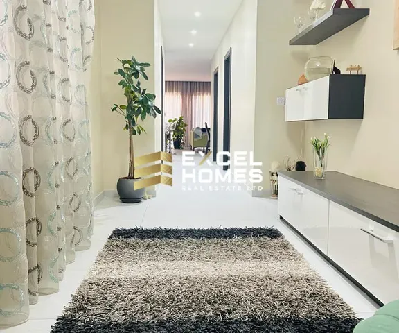 a bathroom with a white counter top and a white rug