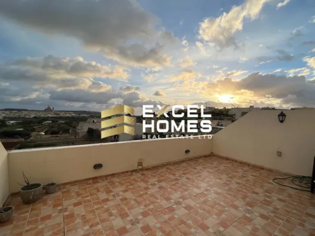 a building with a window and a wall