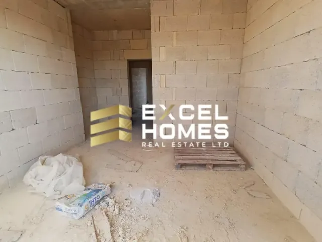 a wall with a broken down toilet and a broken down wall