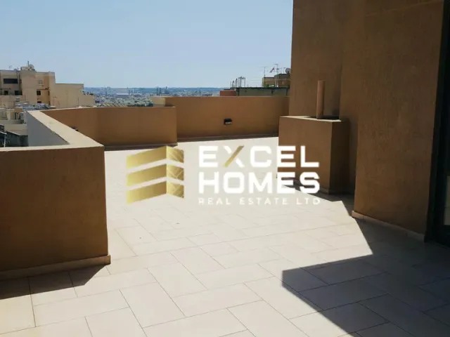 a building with a balcony and a walkway