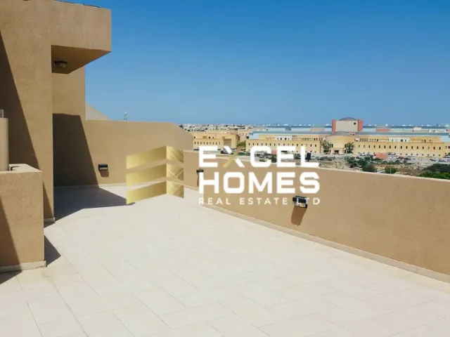 a man riding a skateboard down a ramp