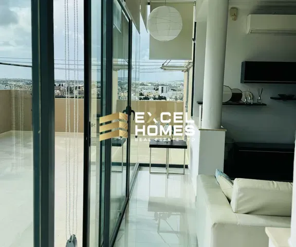 a door to a restaurant with a view of the water