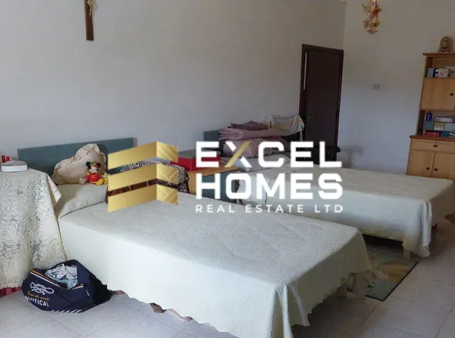 a bed room with a bed and a desk