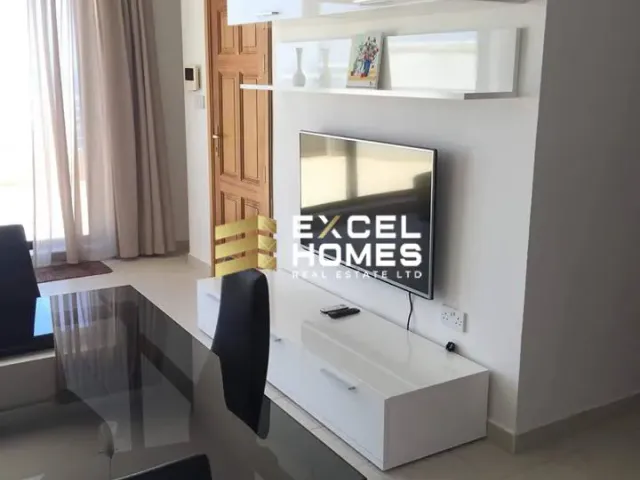 a mirror is on a wall in a room