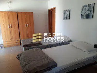 a bed with a white bedspread and a white bedspread 
